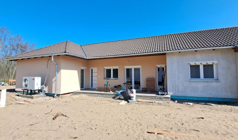 Eladó Ház 2211 Vasad Újépítésű, utcafronti, modern ikerházfél 20 perce Bp-től!