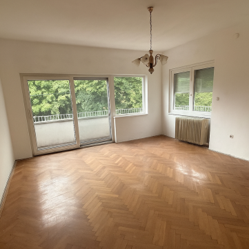 Eladó Lakás 1125 Budapest 12. kerület Kútvölgyben 70%-os társasház tulajdon,nagy kert, beálló!