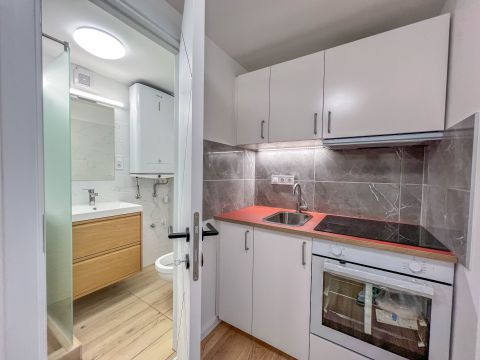 Eladó Lakás 1201 Budapest 20. kerület , Frissen felújított garzonlakás saját kerttel, terasszal