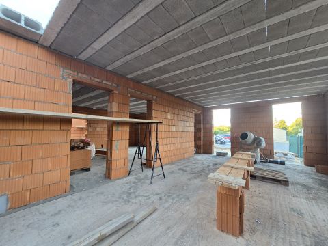 Eladó Lakás 2030 Érd , Új építésű lakás kerttel, autóbeállóval